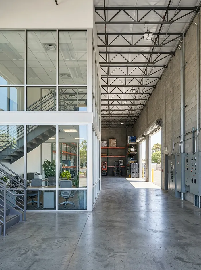 Combined office and warehouse facility leased through Peninsula Commercial Real Estate Group