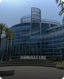 The curved glass Anaheim Convention Center, in the Orange County market served by Peninsula CRE Group