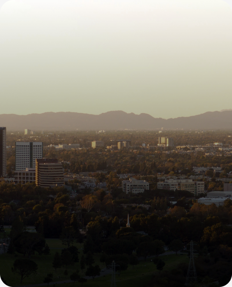 Burbank from above, with the mountains behind, in the Los Angeles County market served by Peninsula CRE Group