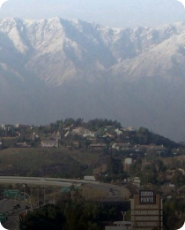 Snow-capped mountains above Corona, in the Inland Empire market served by Peninsula CRE Group