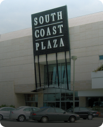 The South Coast Plaza sign in Costa Mesa, in the Orange County market served by Peninsula CRE Group