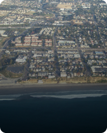 The Encinitas coastline from above, in the San Diego County market served by Peninsula CRE Group