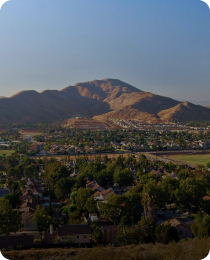 Hills above Jurupa Valley, in the Inland Empire market served by Peninsula CRE Group