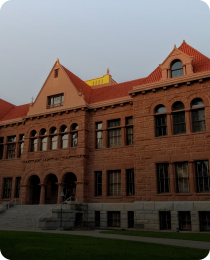 The historic red sandstone courthouse in Santa Ana, in the Orange County market served by Peninsula CRE Group